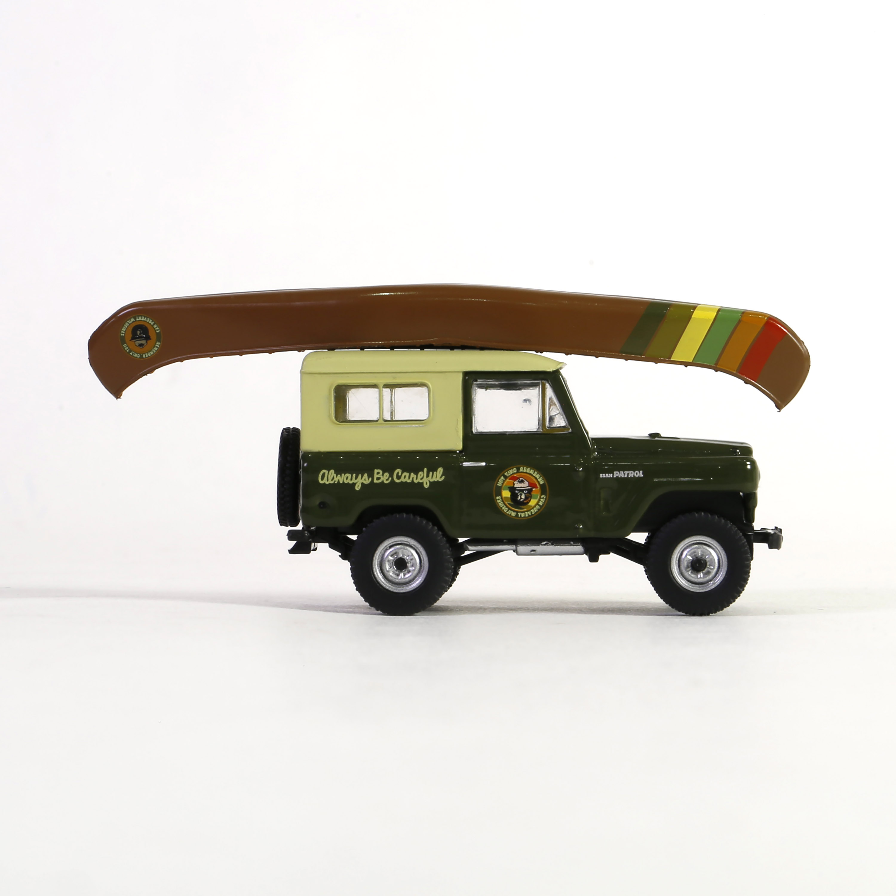 Patrol with Canoe on Roof