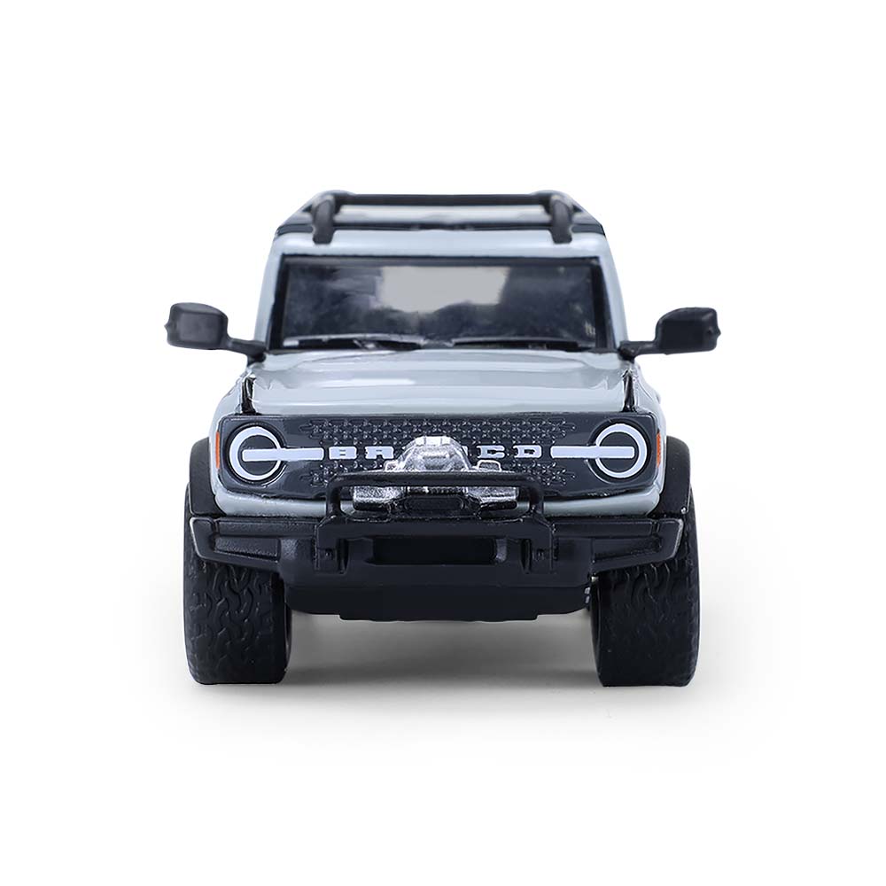 Bronco 4-Door Badlands in Cactus Grey with Utility Trailer and Motorcycle