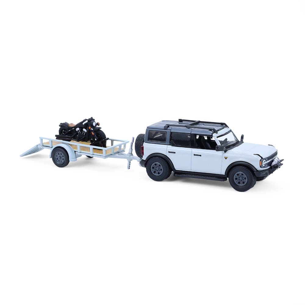 Bronco 4-Door Badlands in Cactus Grey with Utility Trailer and Motorcycle