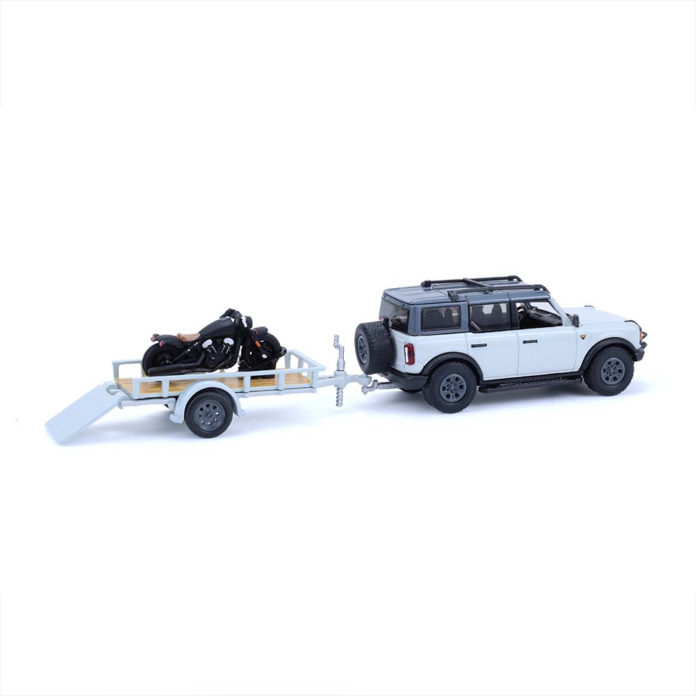 Bronco 4-Door Badlands in Cactus Grey with Utility Trailer and Motorcycle