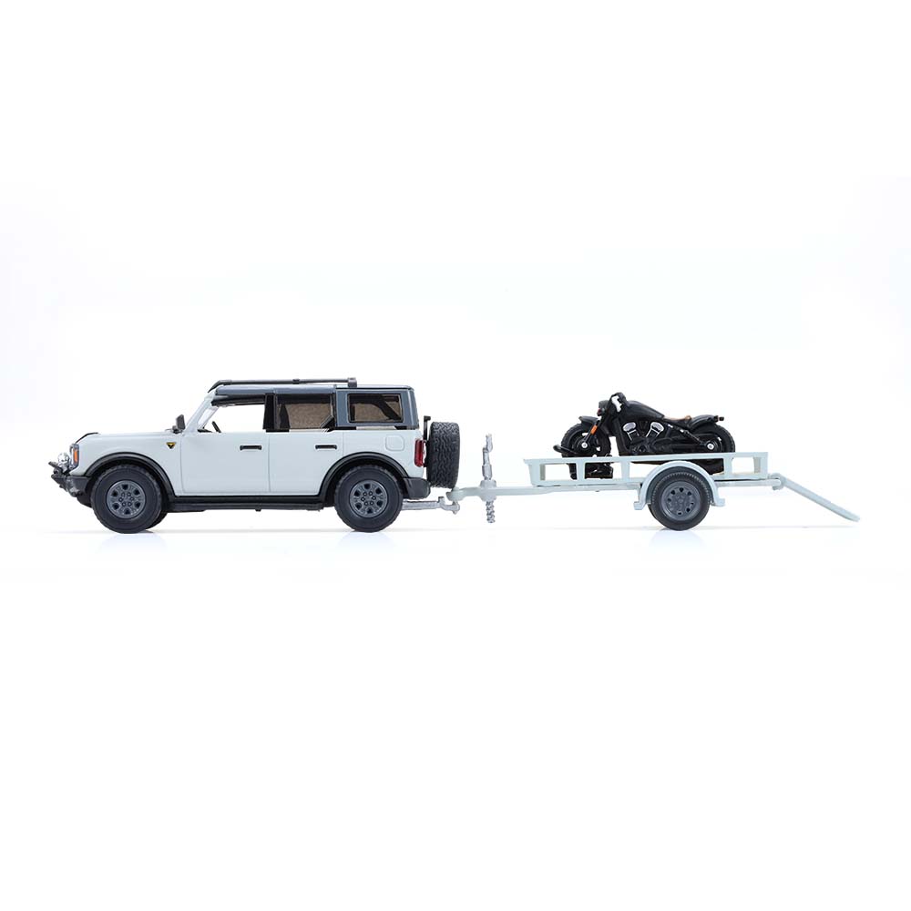 Bronco 4-Door Badlands in Cactus Grey with Utility Trailer and Motorcycle